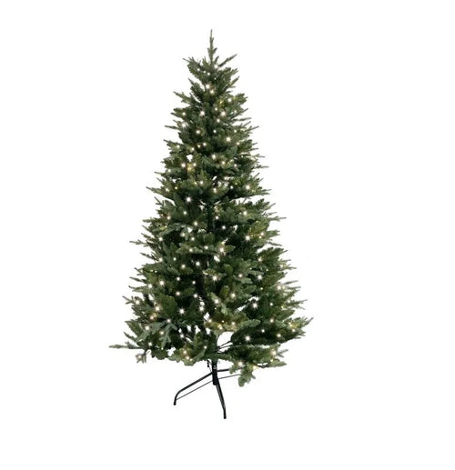 Abeto navideño con 600 luces LED, de pie sobre una superficie neutra.