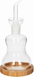 Aceitera Silhouette con base de bambú, diseño italiano de Brandani Gift Group.