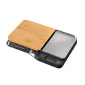 Balanza de cocina de la Techno Collection, con base de acero inoxidable, tabla de bambú y vaso de acero.