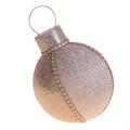 Bola de Navidad redonda con acabado en terciopelo color champagne, con dimensiones de 24 x 20 x 29 cm.