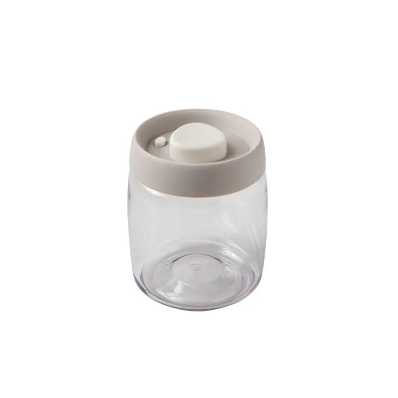 Bote hermético de 600g con tapa blanca y cuerpo en tono arena, diseñado para envasado al vacío.