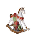 Caballito de balancín decorativo de cerámica blanca con detalles pintados, sobre un fondo neutro.