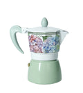 Cafetera de cerámica de 1 taza, colección Flora, con un diseño floral detallado en tonos suaves.