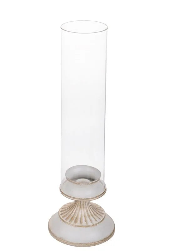 Candelero de cerámica de color rojo intenso con una vela roja colocada en el centro, diseñado por Brandani Gift Group.