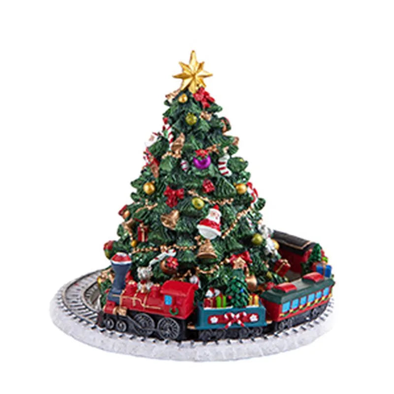 Carrillón navideño de Brandani con figura de abeto y tren en movimiento, sobre fondo blanco.