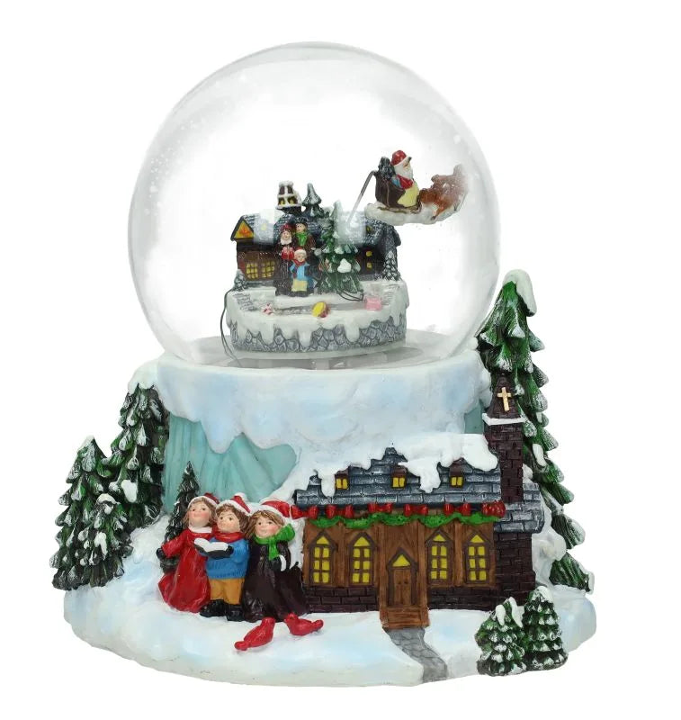 Carrillón navideño con figura de niños cantores, luz y detalles musicales, dimensiones 17x20 cm.