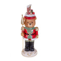 Carrillón de oso navideño con sombrero, vestido y con detalles festivos, de 37 cm de altura.