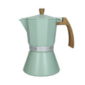Cafetera Tiffany de 12 tazas en color blanco, con detalles dorados y asa ergonómica.