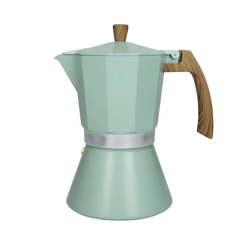 Cafetera Tiffany de 12 tazas en color blanco, con detalles dorados y asa ergonómica.