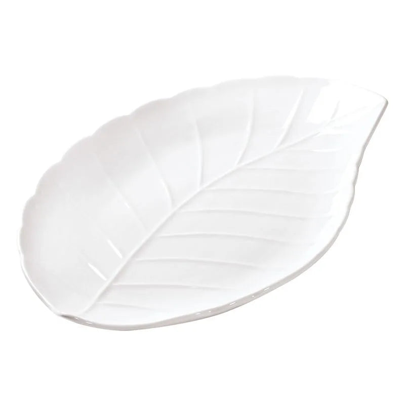 Centro de mesa decorativo Brandani Foglia de 31 cm, combinando porcelana blanca y base de bambú en forma de hoja.