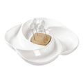 Centro de mesa Girella de Brandani en porcelana blanca y bambú, con cuatro pequeños tenedores a juego sobre la superficie.