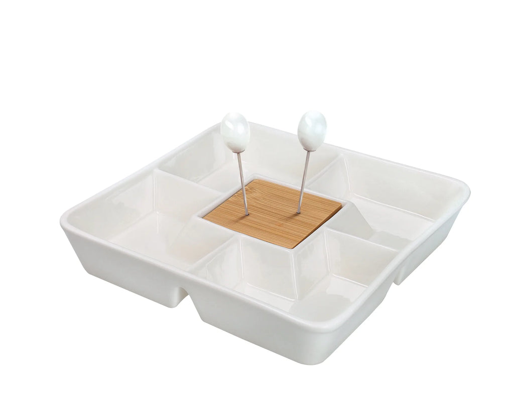Centro de mesa Tetris con dos cucharas de Brandani Gift Group, con un diseño geométrico y moderno.