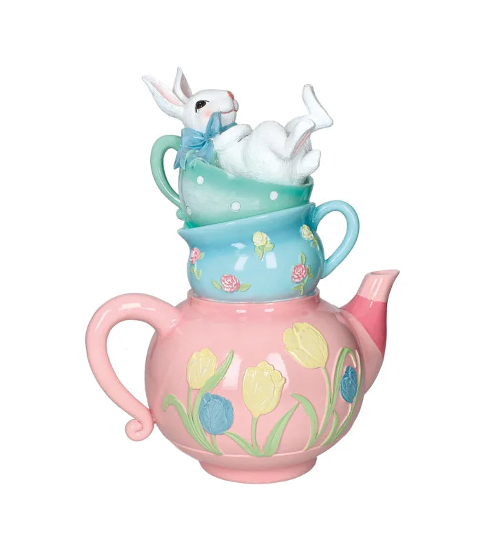 Figura decorativa CONEJITO A LA HORA DEL TÉ, con dimensiones de 28 x 17 x 34 cm.