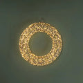 Guirnalda navideña de 40 cm con 960 luces LED de tono cálido, dispuestas en un diseño circular.