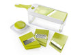 Cortador ajustable de cocina en color verde con contenedor y hojas de acero inoxidable, vista principal.