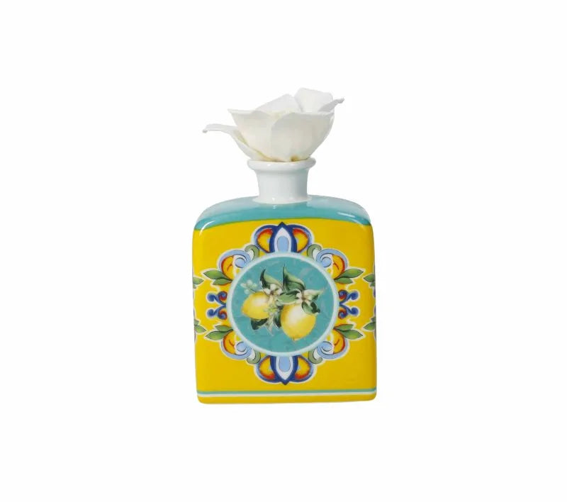 Difusor de fragancia Citrus Amarillo de porcelana, con un diseño vibrante y un aroma cítrico.