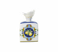 Difusor de fragancia Citrus blanco de porcelana, con tapa y varillas, presentado sobre fondo blanco.
