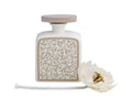 Difusor de fragancia Rizos de Hada de porcelana, con un diseño delicado y acabado blanco.