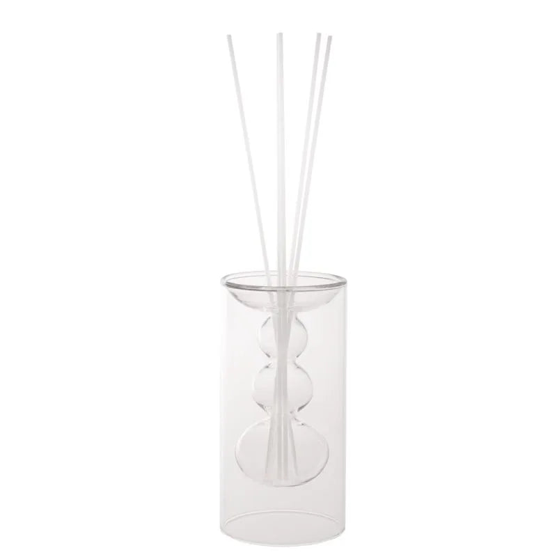 Difusor de fragancia Silhouette transparente con base y tapa.