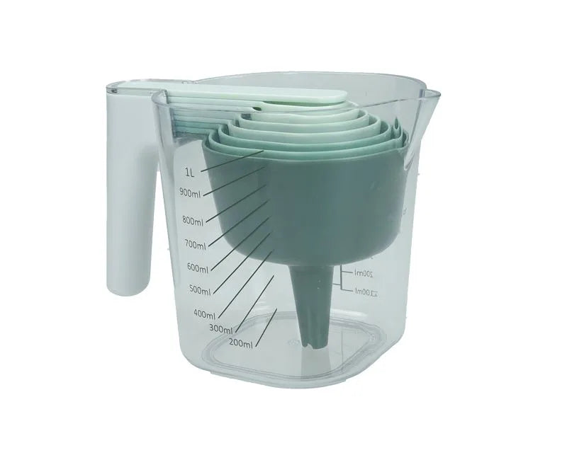 Dosificador graduado verde con 6 medidas para cocina, de diseño italiano.
