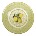 Ensaladera redonda de porcelana blanca con diseño de limones amarillos y hojas verdes, borde en relieve, marca Brandani.