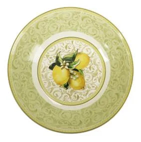 Ensaladera redonda de porcelana blanca con diseño de limones amarillos y hojas verdes, borde en relieve, marca Brandani.
