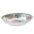Ensaladera oval Flora en melamina blanca con detalles sutiles.