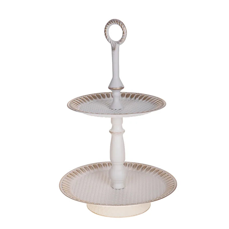 Fuente de dos pisos Brandani en acabado blanco envejecido, con detalles decorativos.