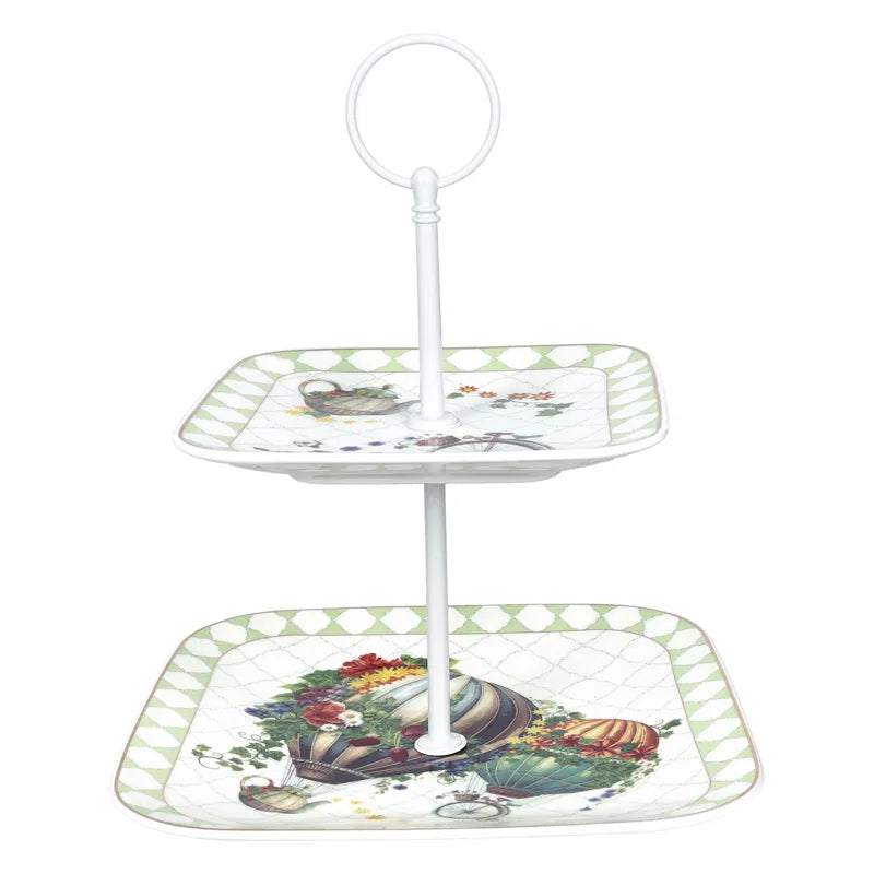 Fuente de 2 pisos de cerámica blanca modelo Wonderland con asta metálica decorativa.