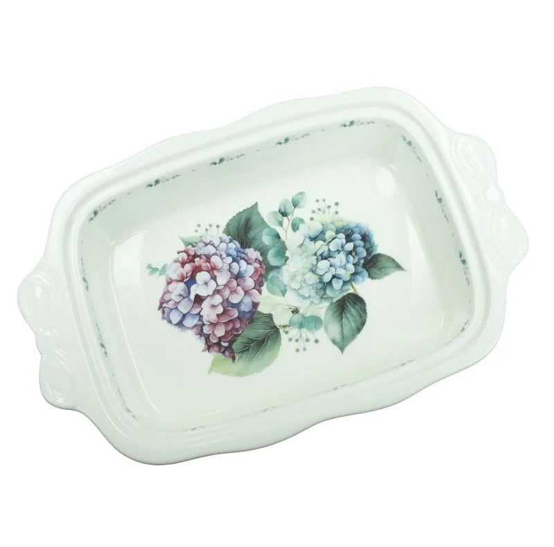 Fuente Horno Flora de cerámica con diseño floral, lista para usar en la cocina.