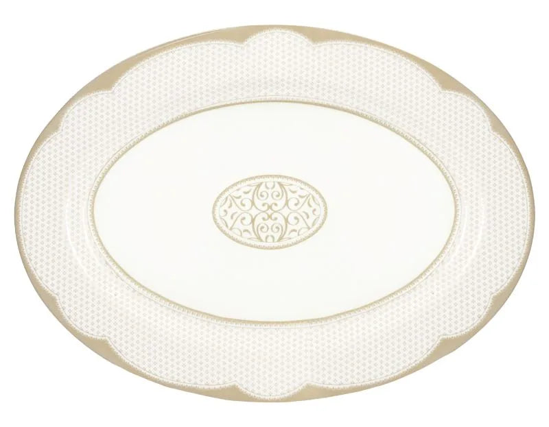 Fuente ovalada de 35 cm con diseño Golden Eye, lista para usar en la mesa.