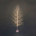 Árbol de Navidad Haya de 180 cm de altura con 1500 microLED integrados y base de 25 cm de diámetro.