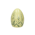 Huevo decorativo de cerámica en color amarillo, diseño italiano de Brandani Gift Group.