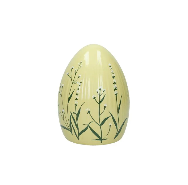 Huevo decorativo de cerámica en color amarillo, diseño italiano de Brandani Gift Group.