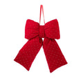 Lazo decorativo de terciopelo rojo sobre fondo blanco, con dimensiones de 28 x 36 cm.