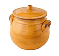 Legumbrera de cerámica amarilla con tapa de terracota, vista frontal.
