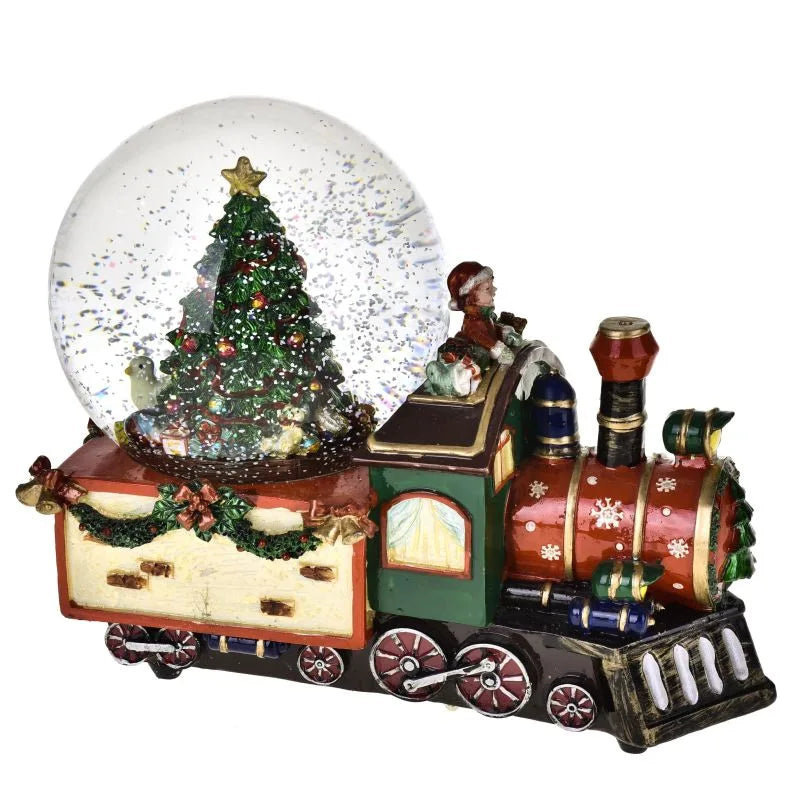 Locomotora decorativa navideña de Brandani Gift Group con bola y carillón, sobre fondo blanco.