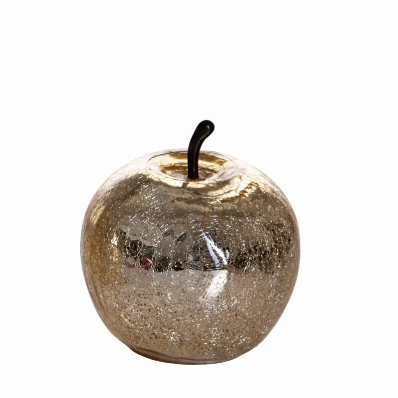Manzana dorada de cristal con 20 luces LED integradas, diámetro 17 cm, sobre fondo neutro.