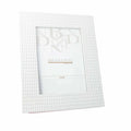 Marco de fotos Lingotto blanco de Brandani, con capacidad para fotografía de 13x18 cm.