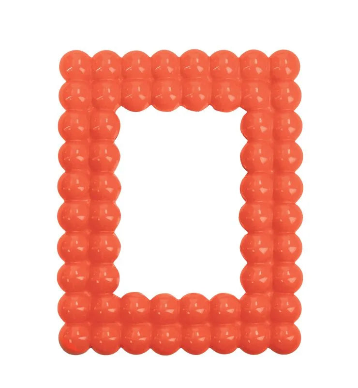 Marco de fotos Lollipop Coral con capacidad para una foto de 10x15 cm. Diseño italiano.