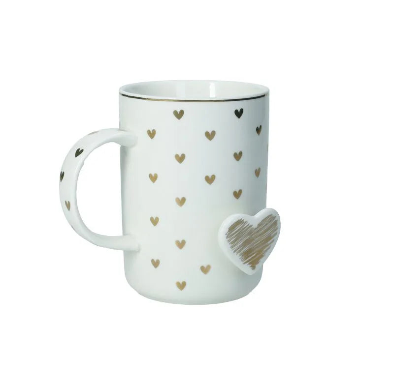 Taza de cerámica blanca con diseño de corazón 'Amore Mio Corazon' de Brandani Gift Group.