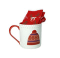 Taza "Sombrero y Calcetín" de algodón con diseño festivo, presentada sobre fondo blanco.