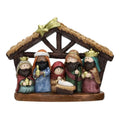 Nacimiento pequeño decorativo elaborado en resina, con figuras detalladas para la ambientación navideña.