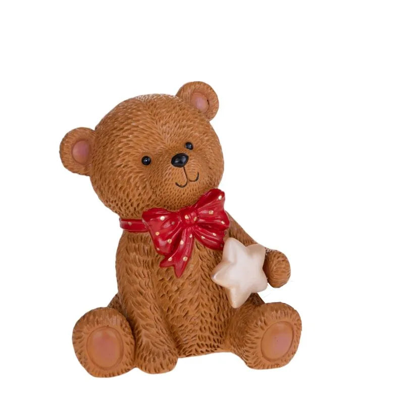 Osito sentado decorativo de cerámica, ideal para adornos navideños.