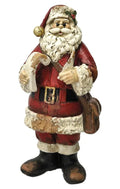 Figura de Papá Noel sosteniendo un pergamino, con detalles de diseño italiano, ideal para decoración navideña.