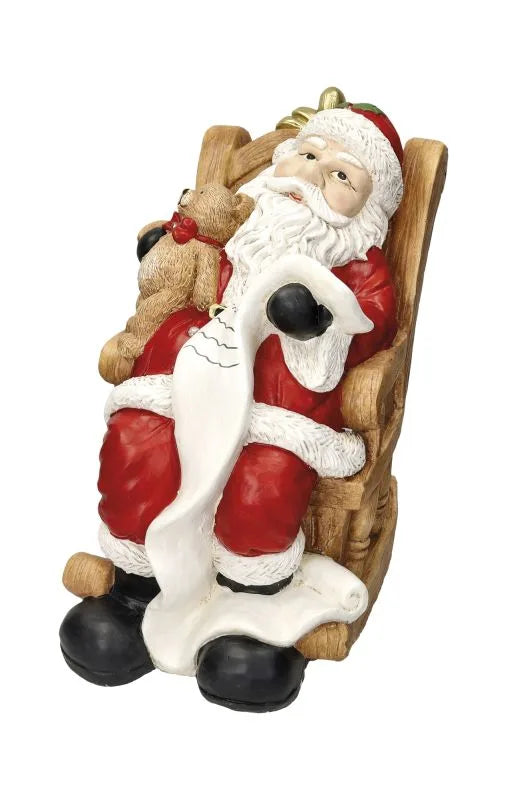 Figura decorativa de Papá Noel sosteniendo un pergamino, con detalles cuidados, marca Brandani Gift Group.