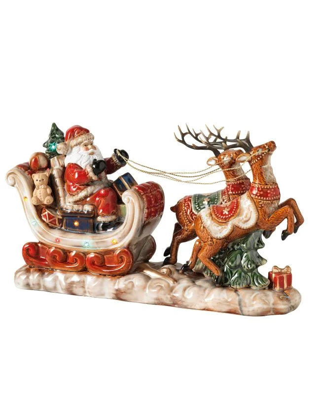 Figura de Papá Noel con reno de 44.5 cm, ideal para decoración navideña.
