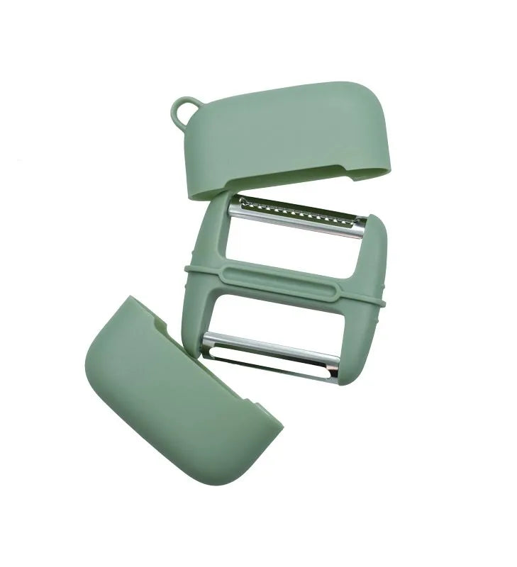Pelador doble lama Brandani de color verde, un utensilio de cocina con diseño italiano.