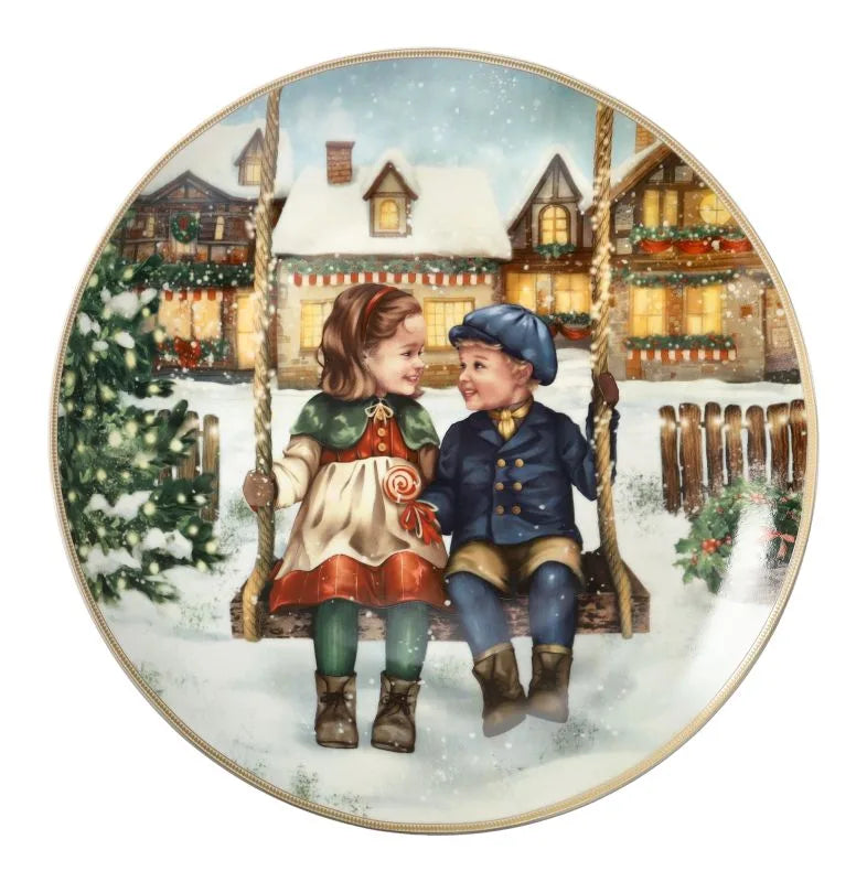 Plato de cerámica de 30 cm de la colección Cuccioli de Brandani, con diseño 'Bimbi Altalena'.