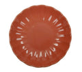 Plato hondo de cerámica de color coral, modelo Calipso, con un diseño italiano moderno.